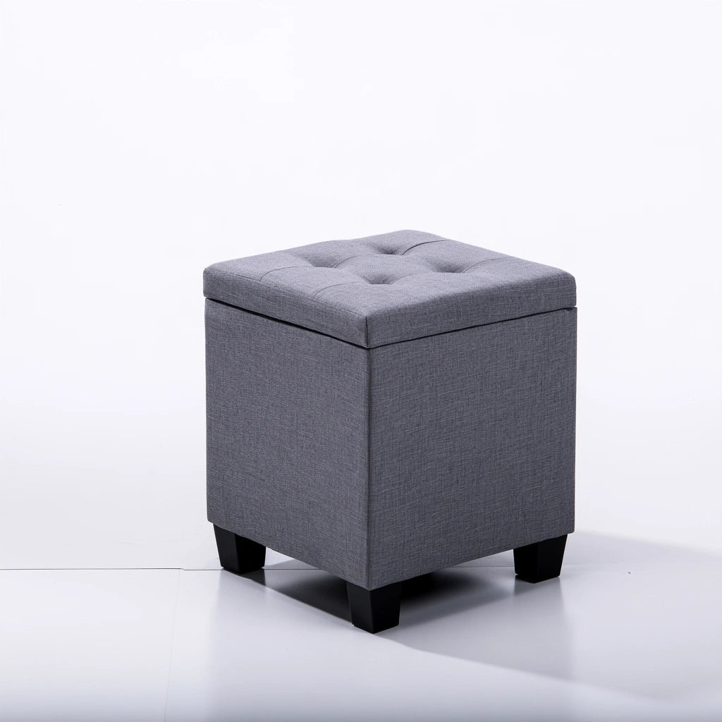 Gray cube-shaped Zenoakstudio storage pouf, versatile ottoman with storage, suitable for living room and home decor.