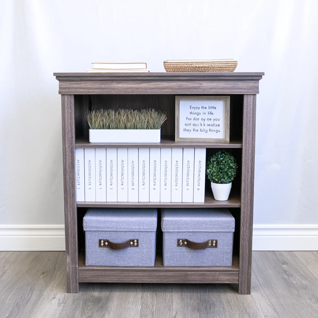 Dark brown wooden bookshelf with three open compartments, part of Zenoakstudio's home and garden library collection.