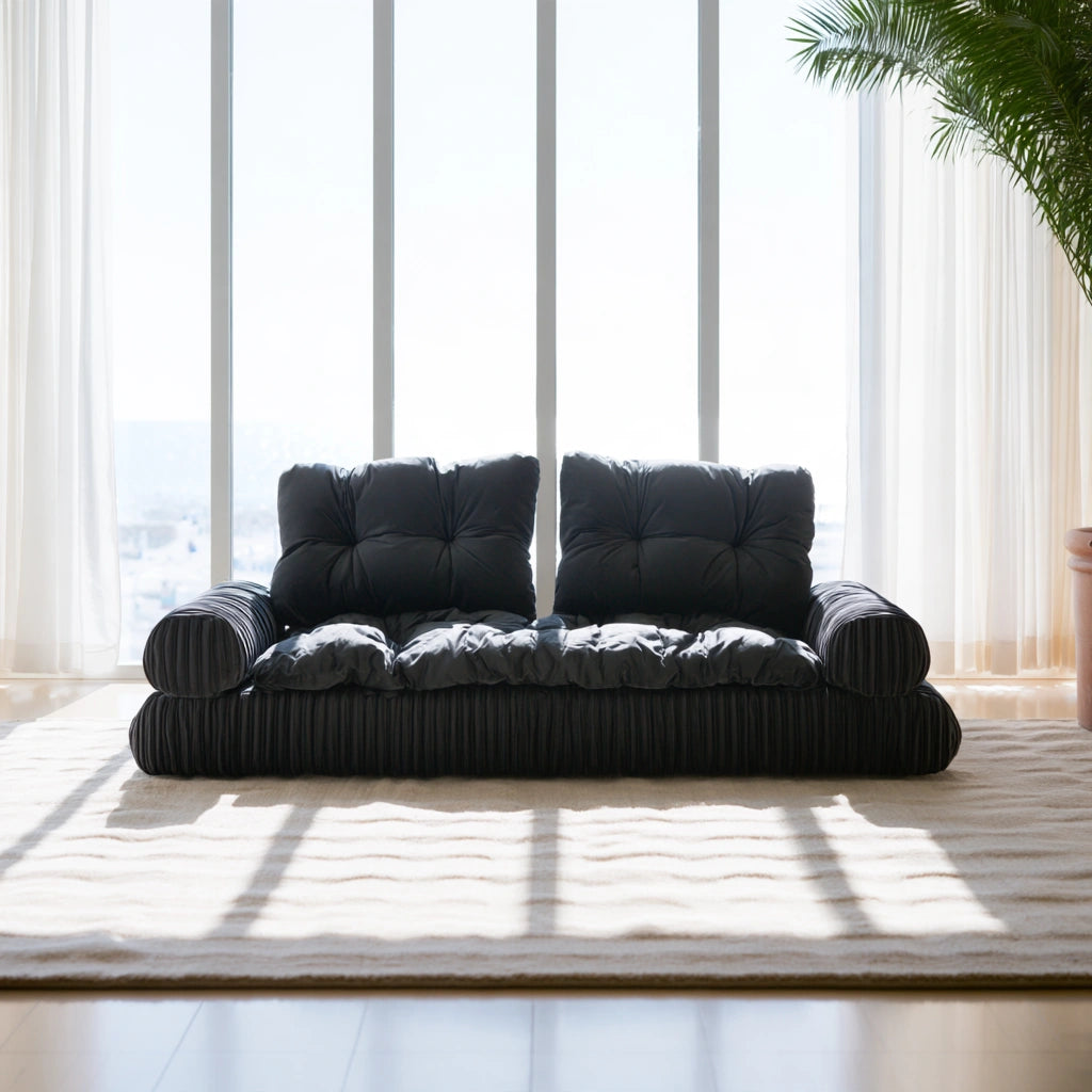 Dark gray velvet two-seater sofa with vertical ribbing, from Zenoakstudio, ideal for modern living room decor.