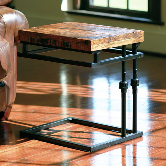 Zenoakstudio C-shaped gray side table with industrial design, perfect for living room or home decor.