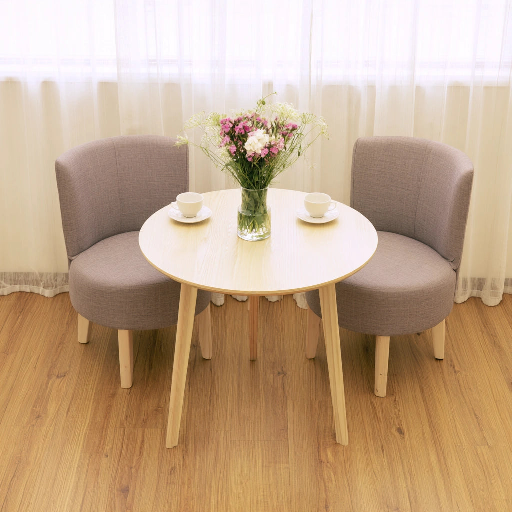 Light brown round wooden side table from Zenoakstudio, ideal for living room or cozy seating areas.