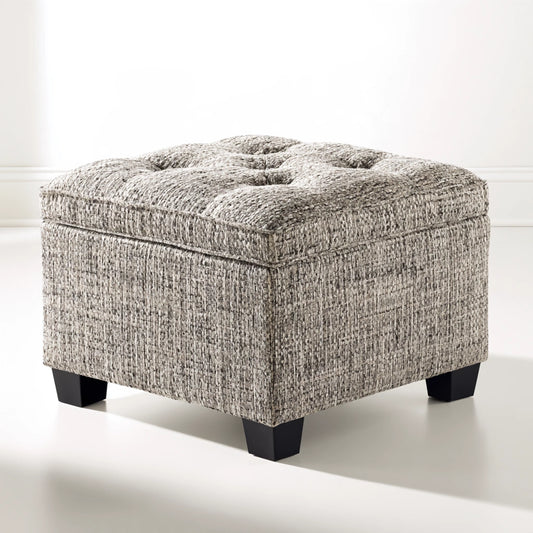 Gray Zenoakstudio cube-shaped storage pouf, versatile ottoman for living room, with a modern, three-quarter view.