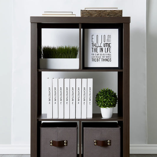 Dark brown wooden bookshelf with three open compartments, ideal for home storage and display in living rooms or offices.