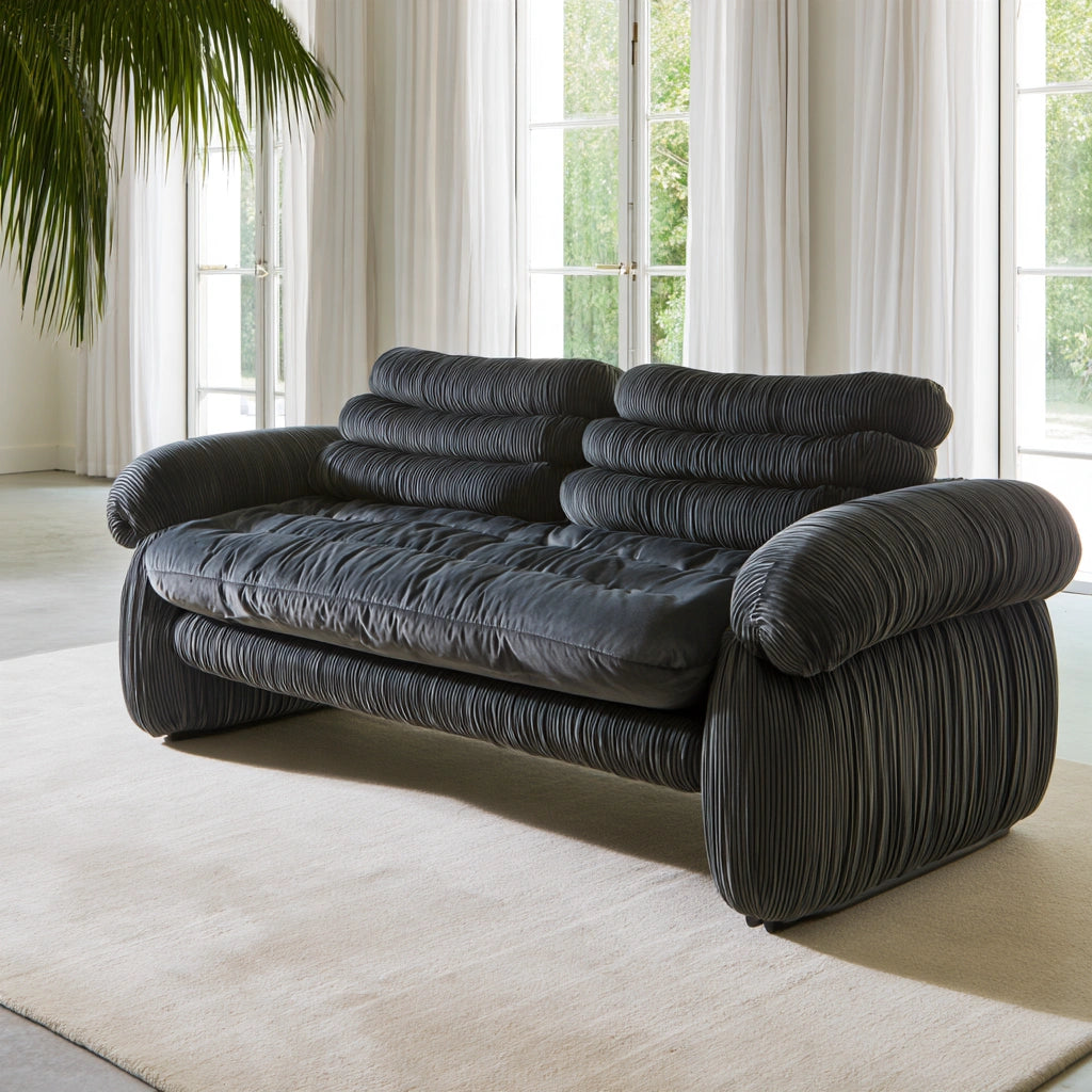 Dark gray velvet two-seater sofa with vertical ribbing, modern design, suitable for living room by Zenoakstudio.