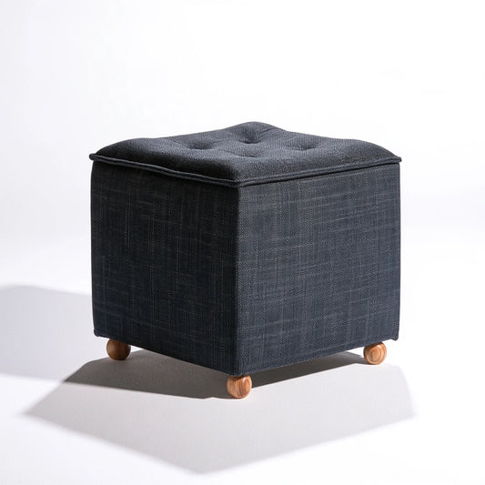 Dark grey fabric square pouf by Zenoakstudio, modern ottoman for living room, square shape with soft upholstered surface.