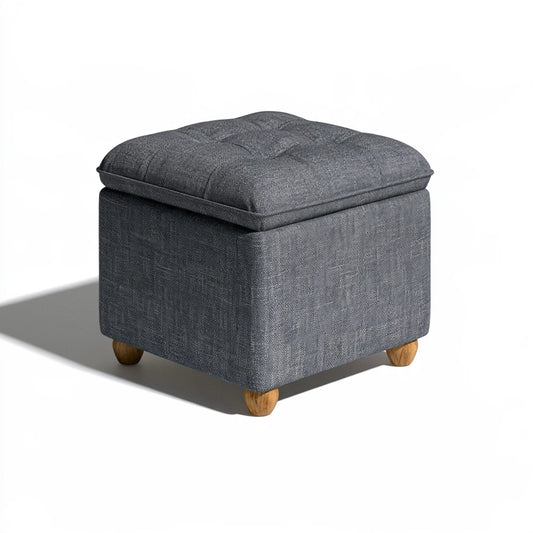 Dark grey fabric square pouf by Zenoakstudio, modern ottoman for living room decor, soft textured upholstery.